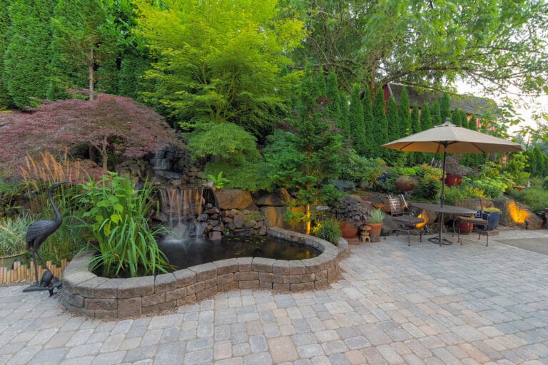 Backyard Landscaping Patio with Waterfall Pond